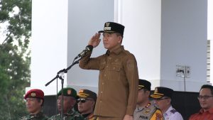 Bupati Konawe Selatan Bacakan Amanat Kapolri pada Apel Gelar Pasukan Operasi Ketupat 2026